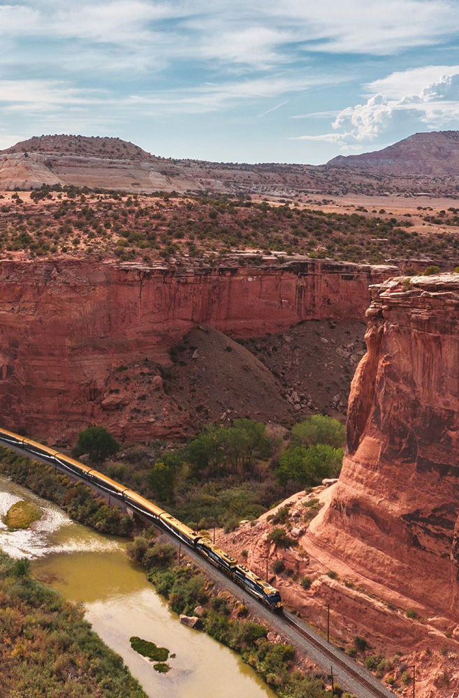 Canyon Spirit traveling past Ruby Canyon on Rockies to the Red Rocks route.